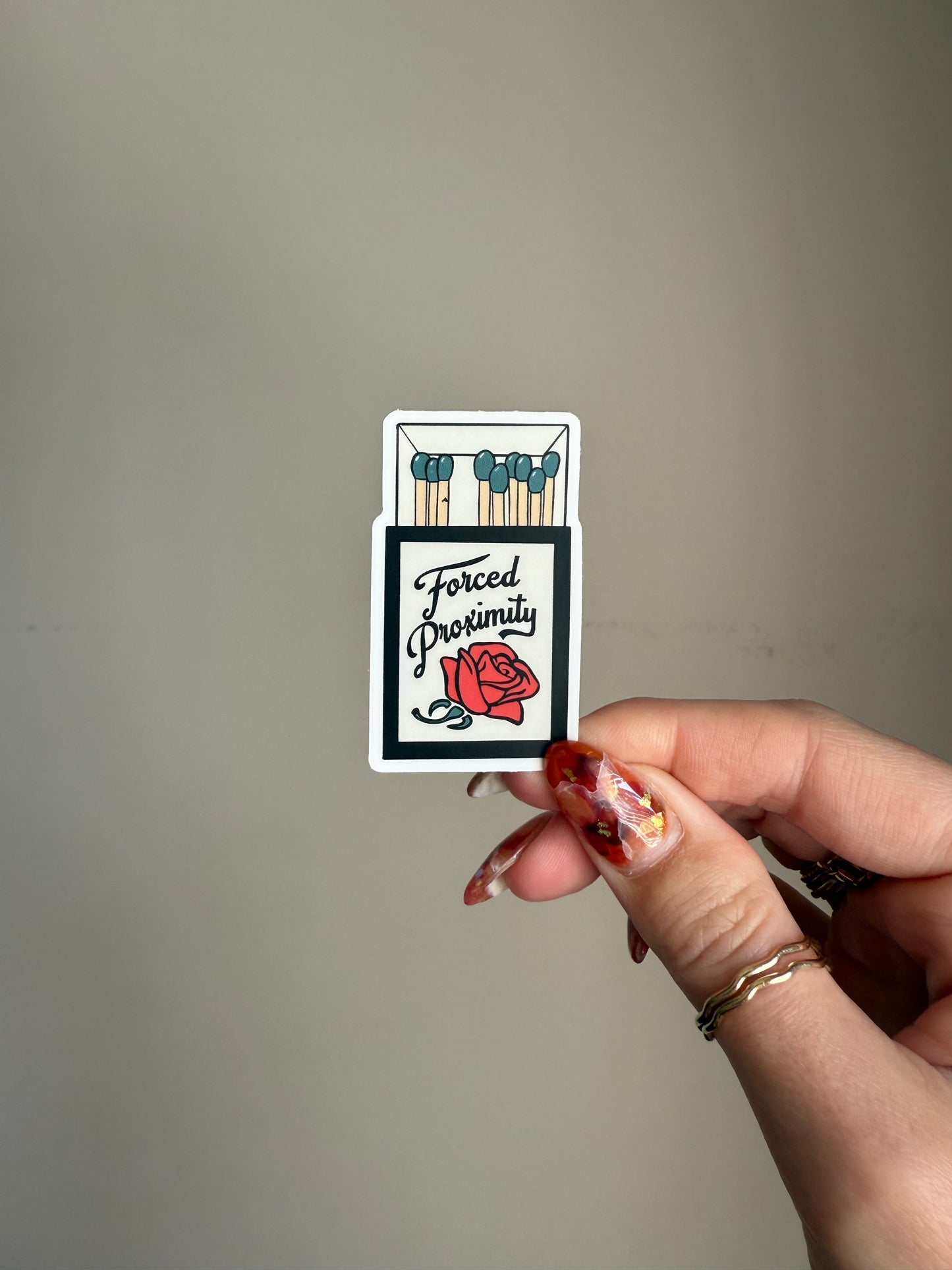 Forced Proximity Trope Matchbook Sticker