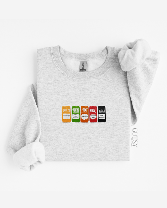 Saucy Genres Embroidered Crewneck Sweater